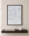 Personalised minimal map print in cool blue-grey tones with a location pin, printed on archival matt paper and displayed as wall art