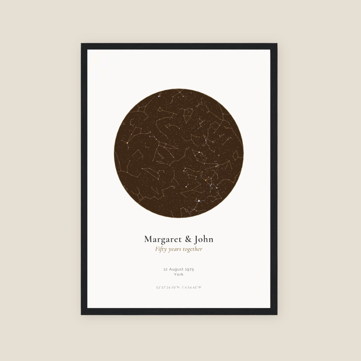 Personalised star map print, Jewel, Amber palette, in a black frame, A3 portrait, showing the night sky over York with the names Margaret & John