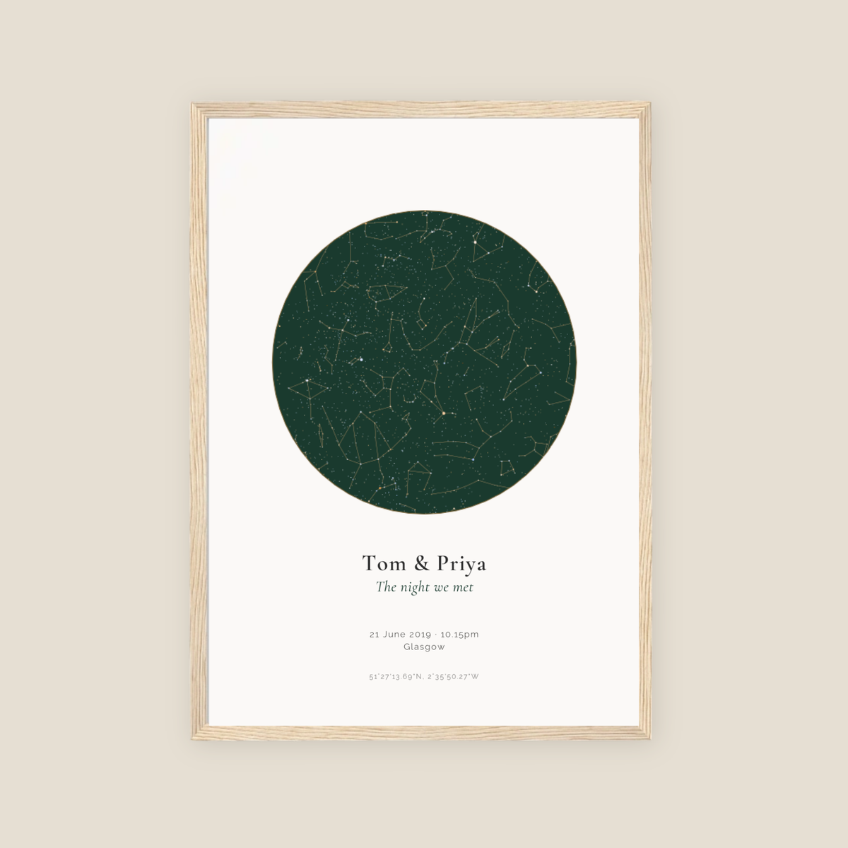 Personalised star map print, Jewel, Emerald palette, in an oak coloured frame, A3 portrait, showing the night sky over Bristol with the names Tom & Priya